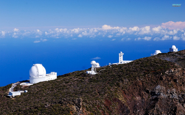 Mountain telescopes water clouds sky free wallpaper - medium preview image