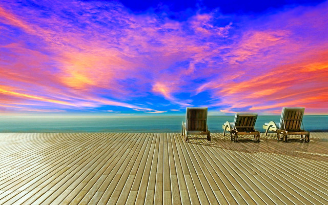 Ocean deck chairs bridge sunset free wallpaper - medium preview image