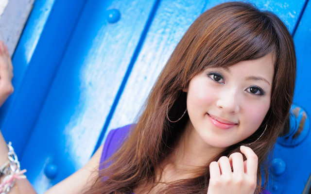 Woman blue wall ring necklace free wallpaper - medium preview image