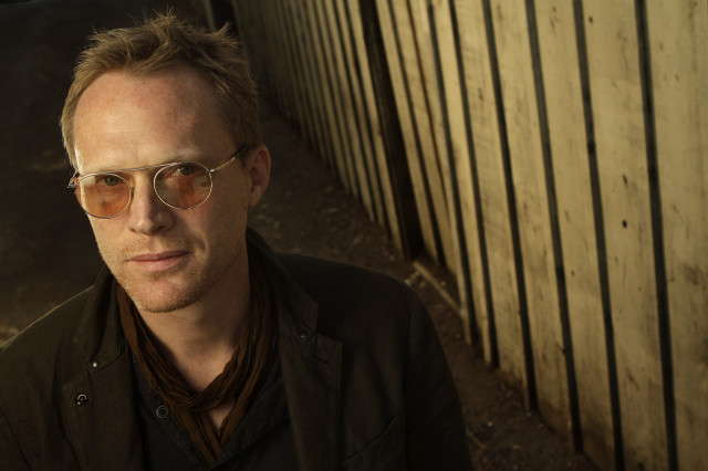 Man glasses brownjacket woodenfence portrait free wallpaper - medium preview image