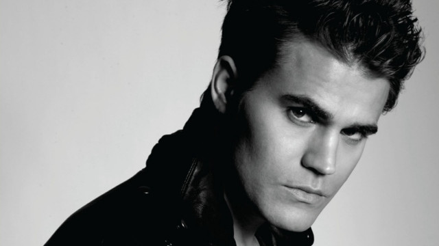 Man black jacket posing hand free wallpaper - medium preview image