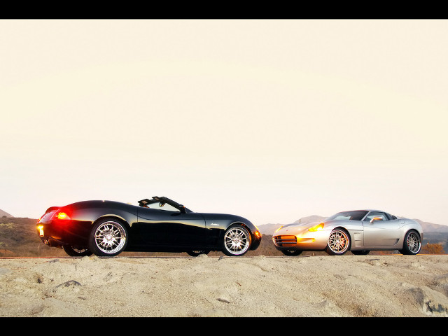 Two cars parked road mountain free wallpaper - medium preview image