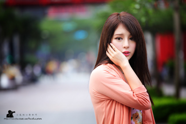 Serious asian woman longhair bangs free wallpaper - medium preview image