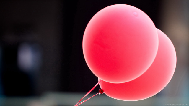 Red balloon closeup black background free wallpaper - medium preview image