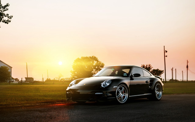 Black car parked road sunset free wallpaper - medium preview image