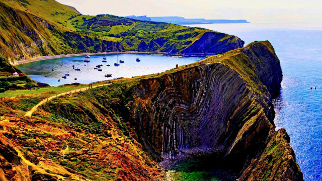 Cliff water boat scenery nature free wallpaper - medium preview image
