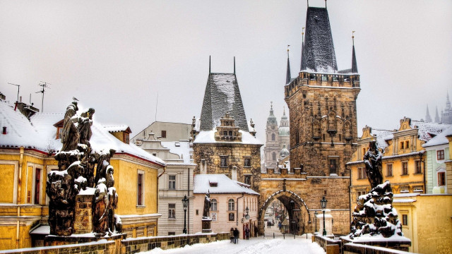Snowy european city church clock free wallpaper - medium preview image