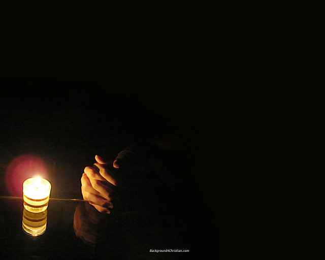 Person holding lit candle dark #2 free wallpaper - medium preview image