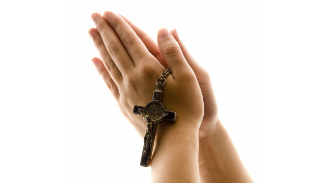 Person holding cross arm chain free wallpaper - medium preview image