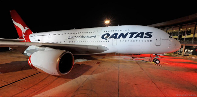 Airplane parked airport night lights free wallpaper - medium preview image