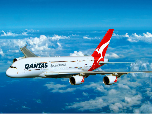 Qantas airplane flying sky clouds free wallpaper - medium preview image