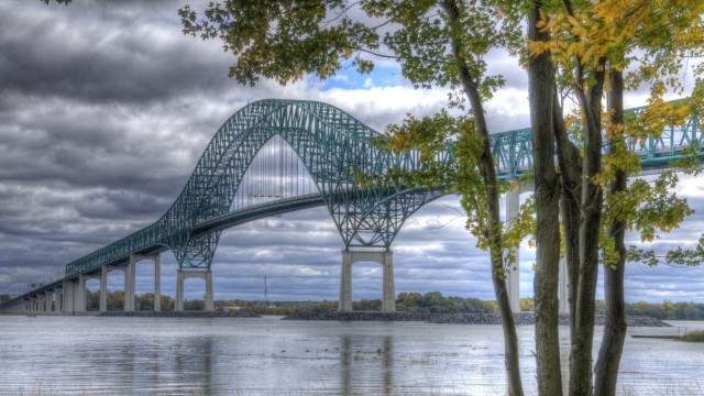 Bridge water cloudy sky trees free wallpaper - medium preview image
