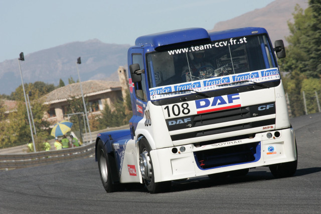 Truck driving road mountains person free wallpaper - medium preview image