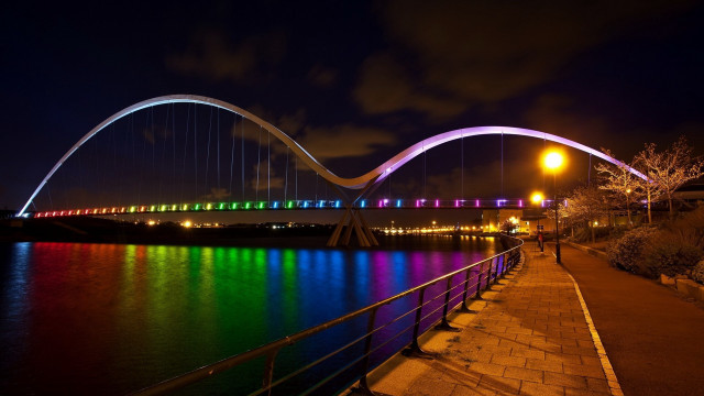 Bridge lit rainbow light person free wallpaper - medium preview image
