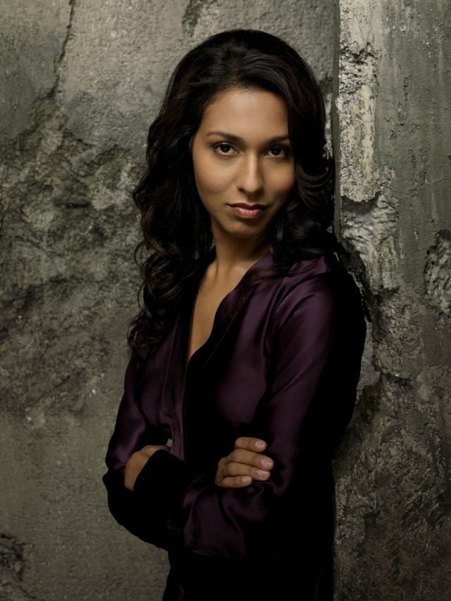 Woman purple shirt pose picture free wallpaper - medium preview image
