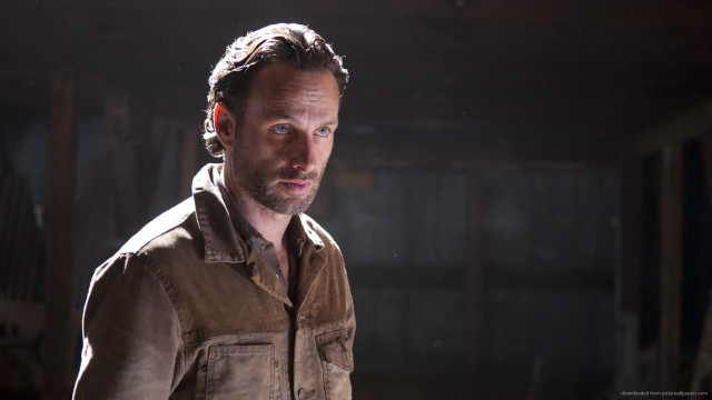 Man brown shirt serious look #3 free wallpaper - medium preview image
