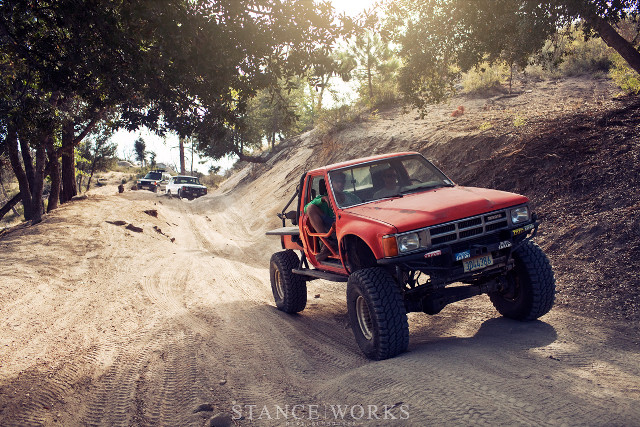 Red truck dirt road forest #2 free wallpaper - medium preview image