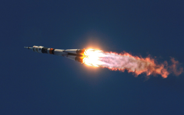 Rocket flying smoke bright orange free wallpaper - medium preview image