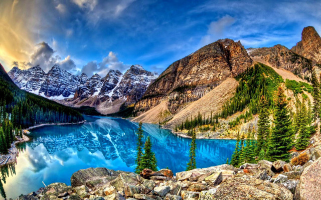 Mountain lake rocks trees sky free wallpaper - medium preview image