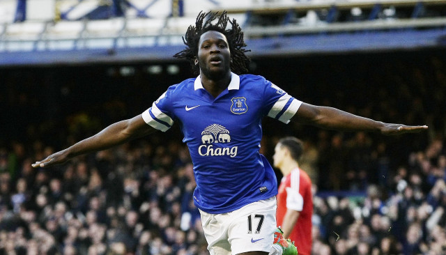 Celebrating man blue shirt soccer free wallpaper - medium preview image