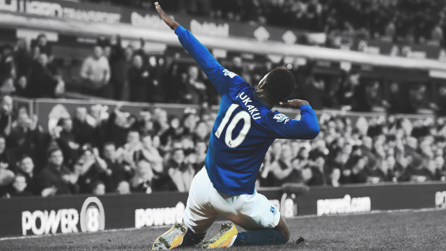 Soccer player kneeling crowd stadium free wallpaper - medium preview image