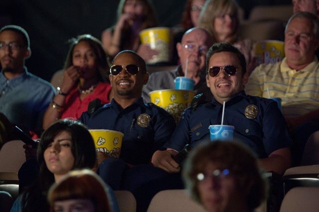 Crowd watching movie officers laps free wallpaper - medium preview image