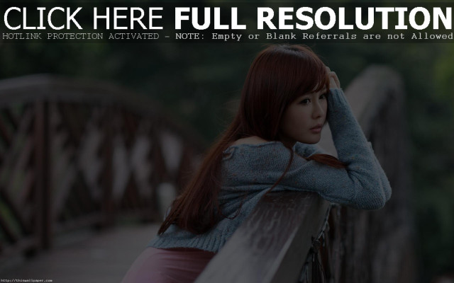Woman leaning wooden bench hand free wallpaper - medium preview image