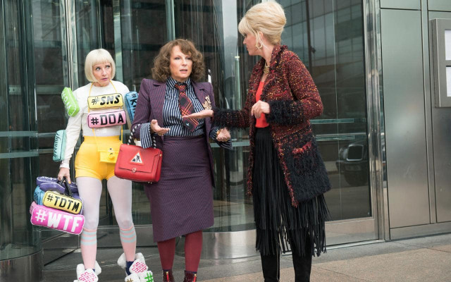 Three women outside building talking free wallpaper - medium preview image