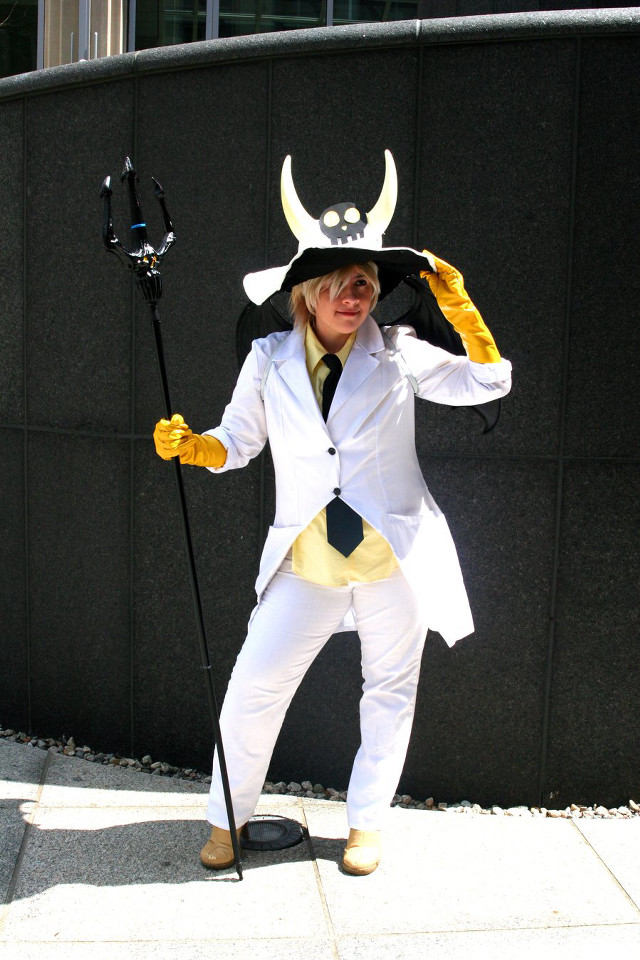 Man costume horned hat cane free wallpaper - medium preview image