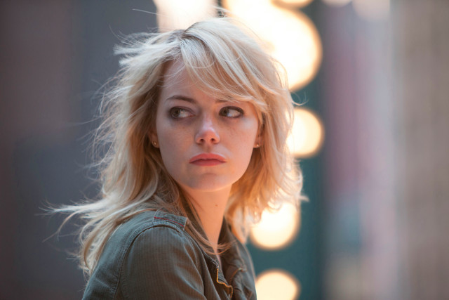 Blonde woman green shirt serious free wallpaper for desktop - medium preview image
