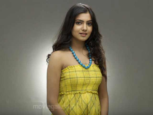 Woman yellow dress necklace blue free wallpaper - medium preview image