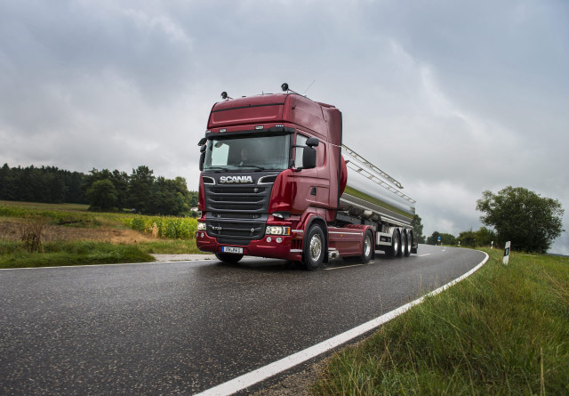 Red semi truck green field free wallpaper - medium preview image