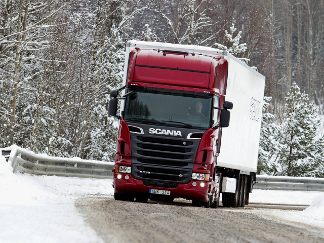 Red semi truck snowy forest free wallpaper - medium preview image