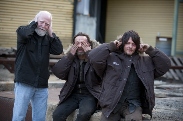 Men sitting curb hands covering free wallpaper - medium preview image