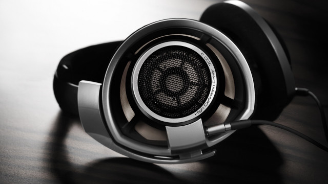 Headphones closeup black background logo free wallpaper - medium preview image