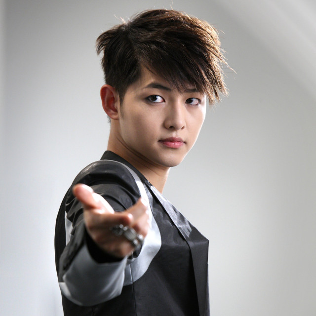 Man black shirt vest pointing free wallpaper - medium preview image