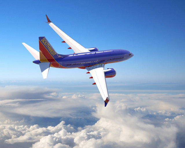 Large blue red airplane flying free wallpaper - medium preview image