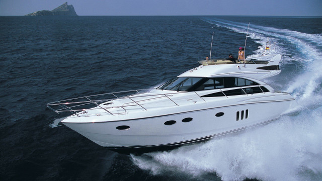 White boat water rock person free wallpaper - medium preview image