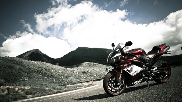 Red motorcycle parked road mountains free wallpaper - medium preview image