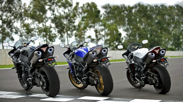Motorcycles parked race track trees free wallpaper - medium preview image