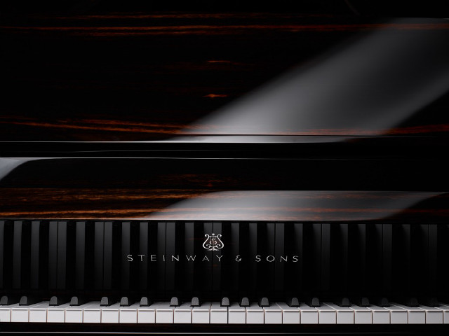 Piano blackcase whitekeyboard logo blackbackground free wallpaper - medium preview image
