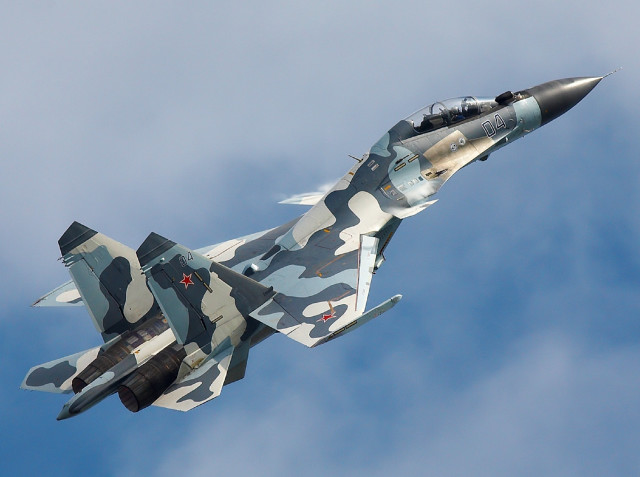 Camouflaged fighter jet cloudy sky #3 free wallpaper - medium preview image