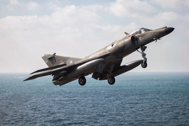 Fighter jet ocean cloudy landing free wallpaper - medium preview image