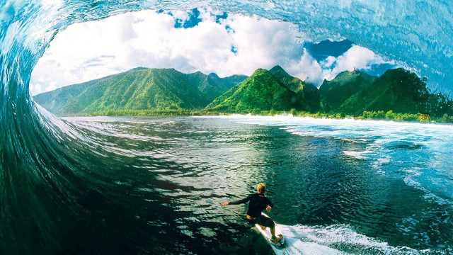 Man riding wave surfboard ocean #10 free wallpaper - medium preview image