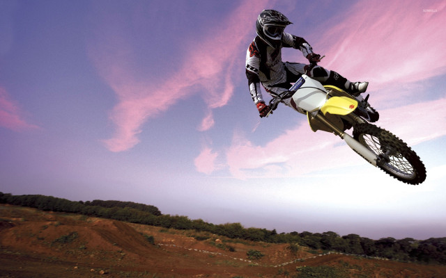 Man motorcycle air trick yellow free wallpaper - medium preview image