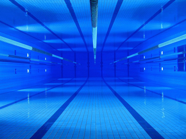 Blue tiled hallway clock wall free wallpaper - medium preview image