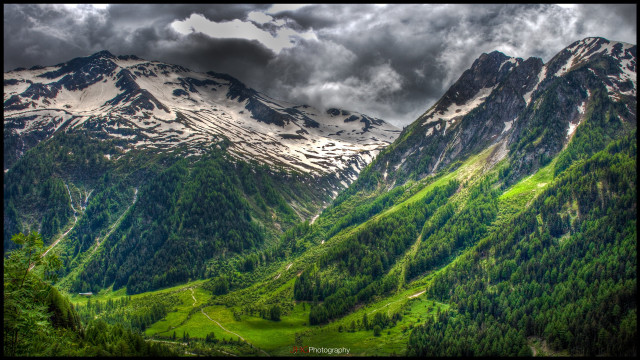Mountain range valley forest cloudy free wallpaper - medium preview image