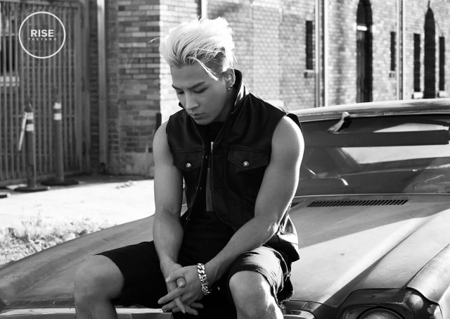 Man sitting hood car hands free wallpaper - medium preview image
