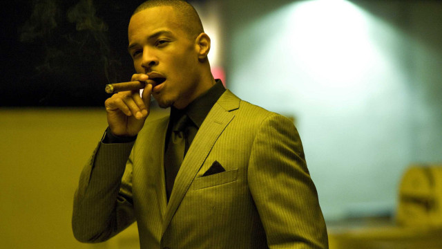 Man suit smoking cigarette room free wallpaper - medium preview image
