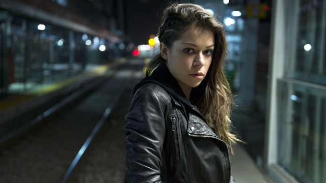 Woman standing train station night free wallpaper - medium preview image